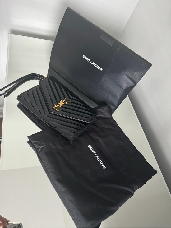 Saint Laurent Handbags - Yves Saint Laurent Cassandre Black Patent Leather Wristlet with Gold YSL